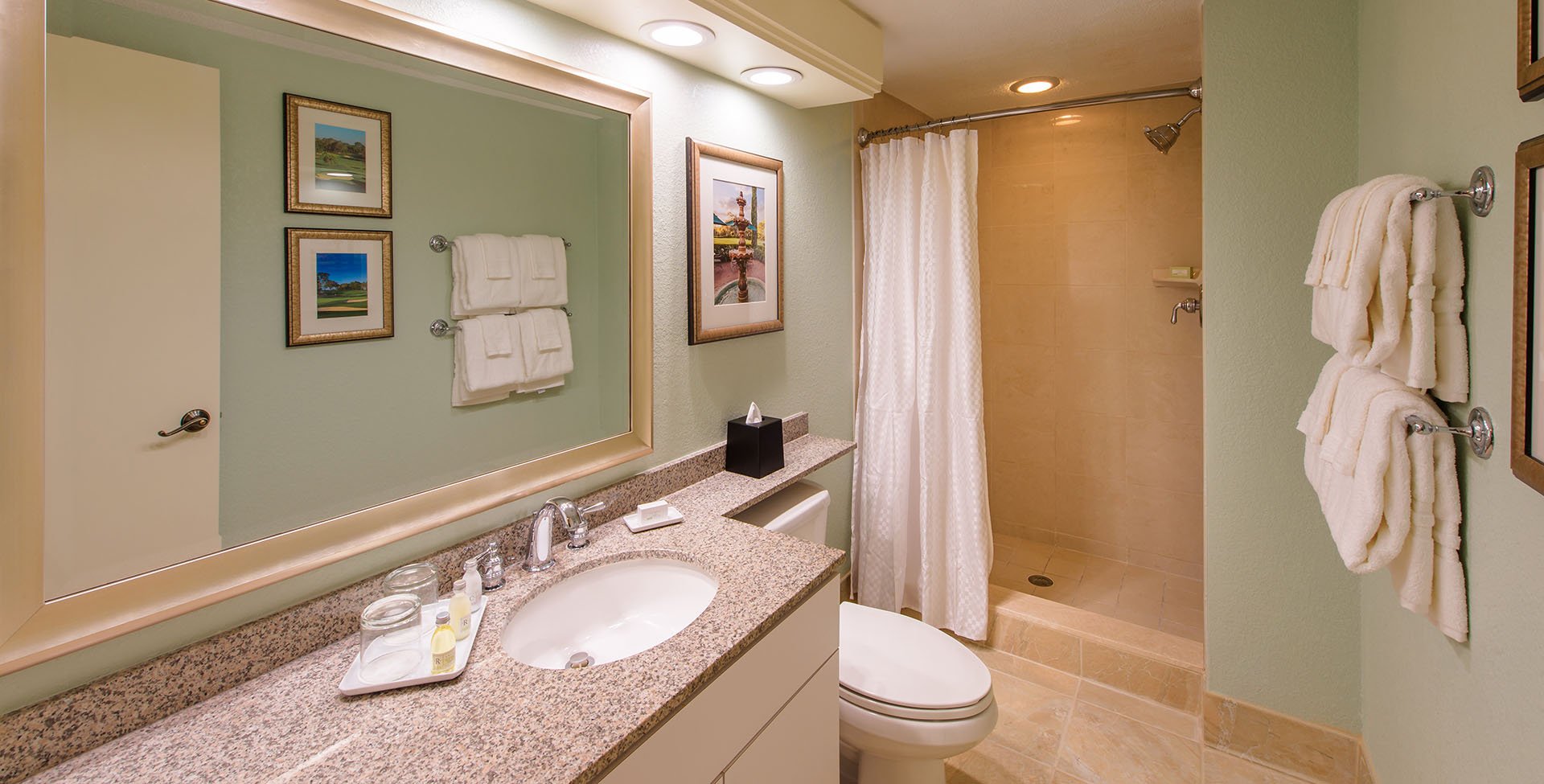 a bathroom in one of the hotel rooms