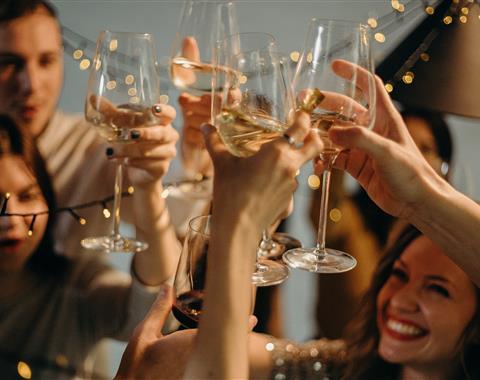 A group toasting with drinks