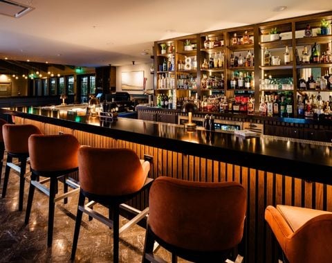 Flowers in front of a set of stairs