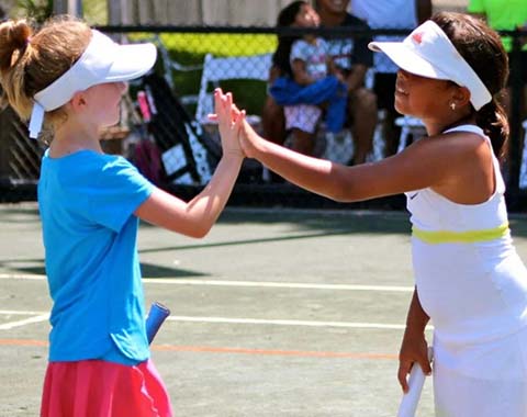 Two kids high-fiving