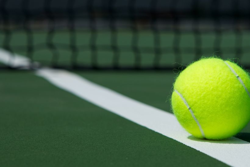 tennis ball on tennis court