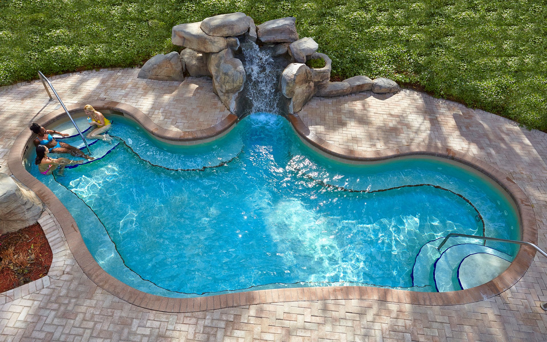 A small pool with a waterfall