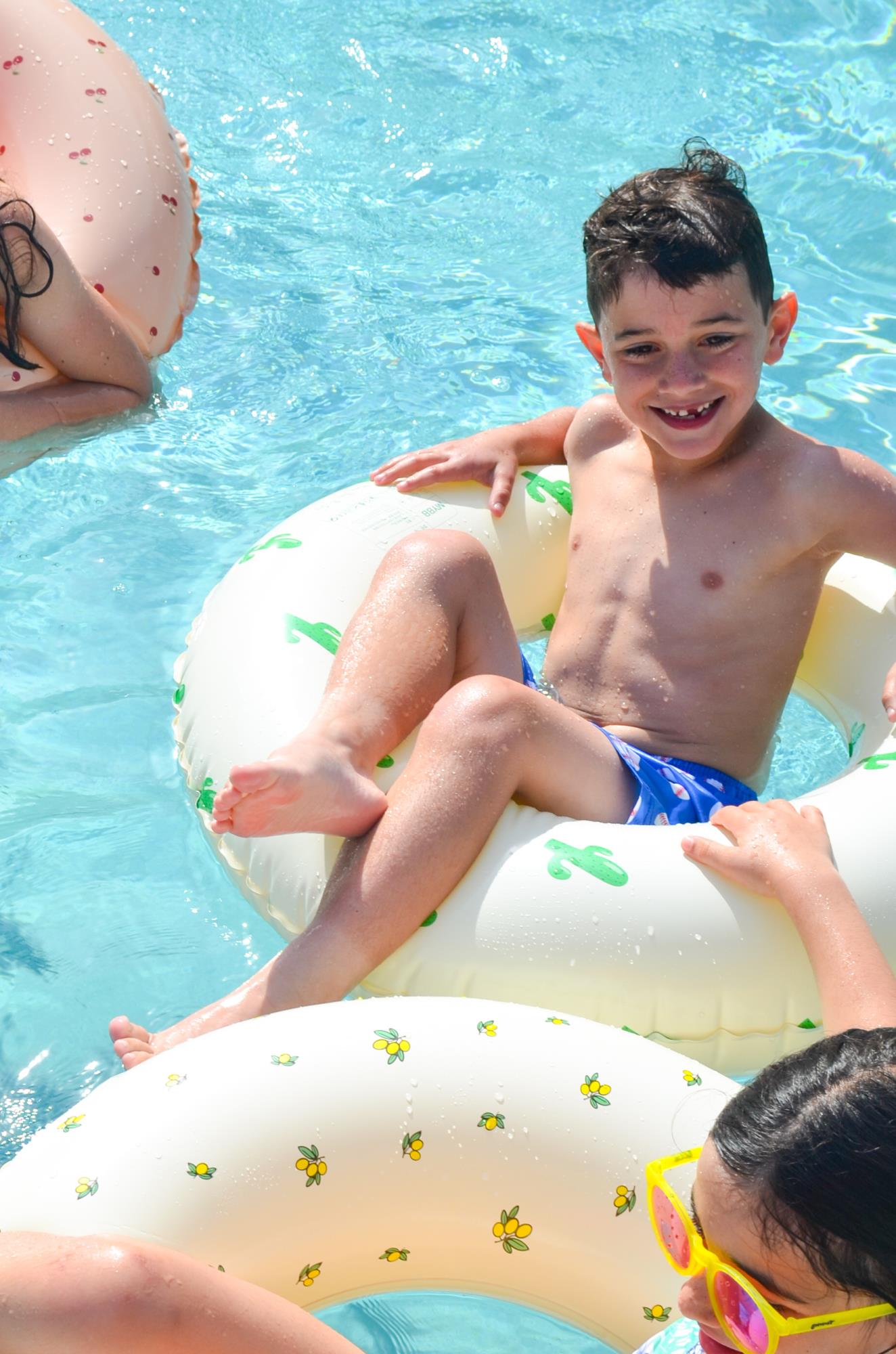 Kids floating in the lazy river