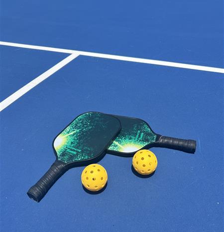 Pickleball Paddles on Court