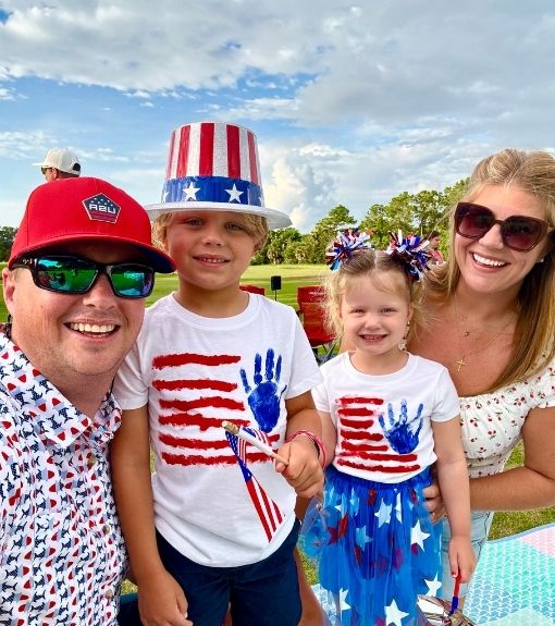 children with face paintings at the pool