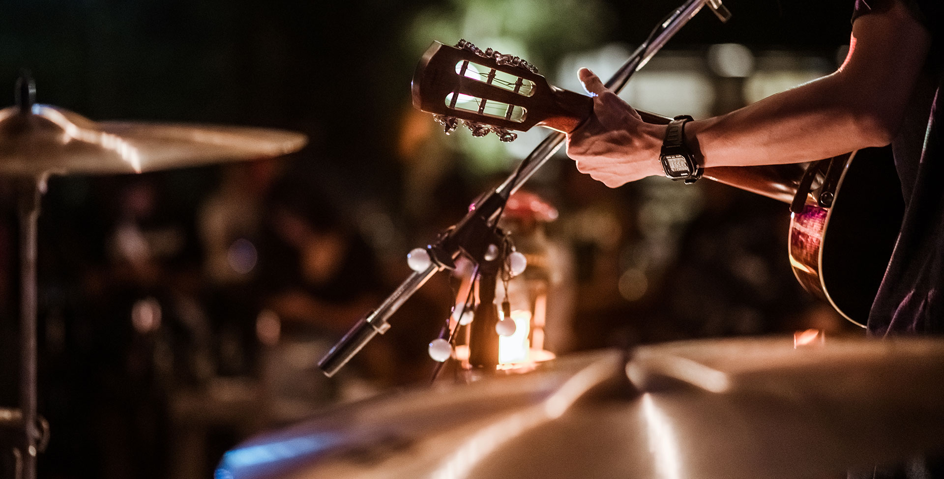 People playing instruments on stage