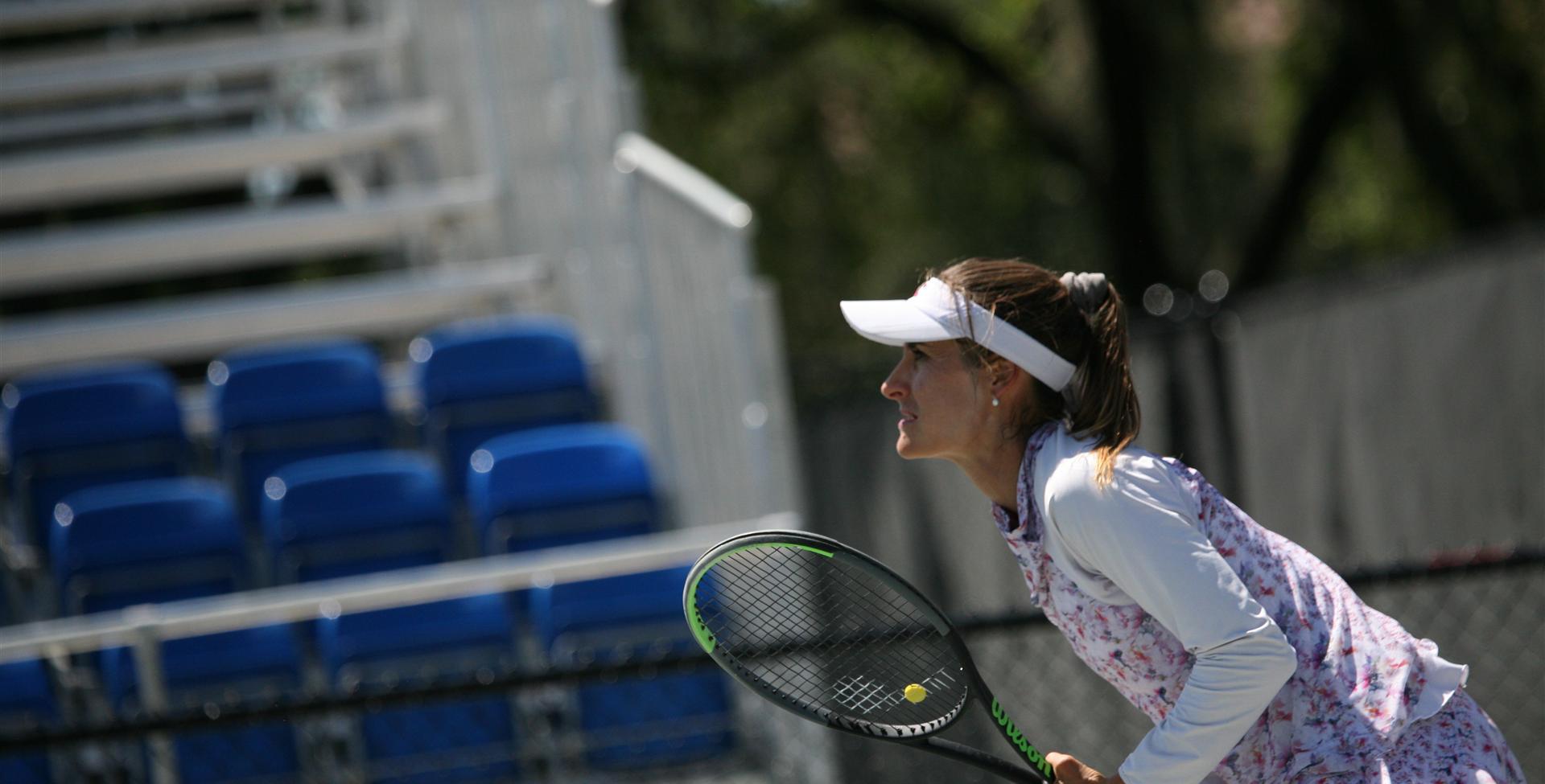 A woman playing tennis