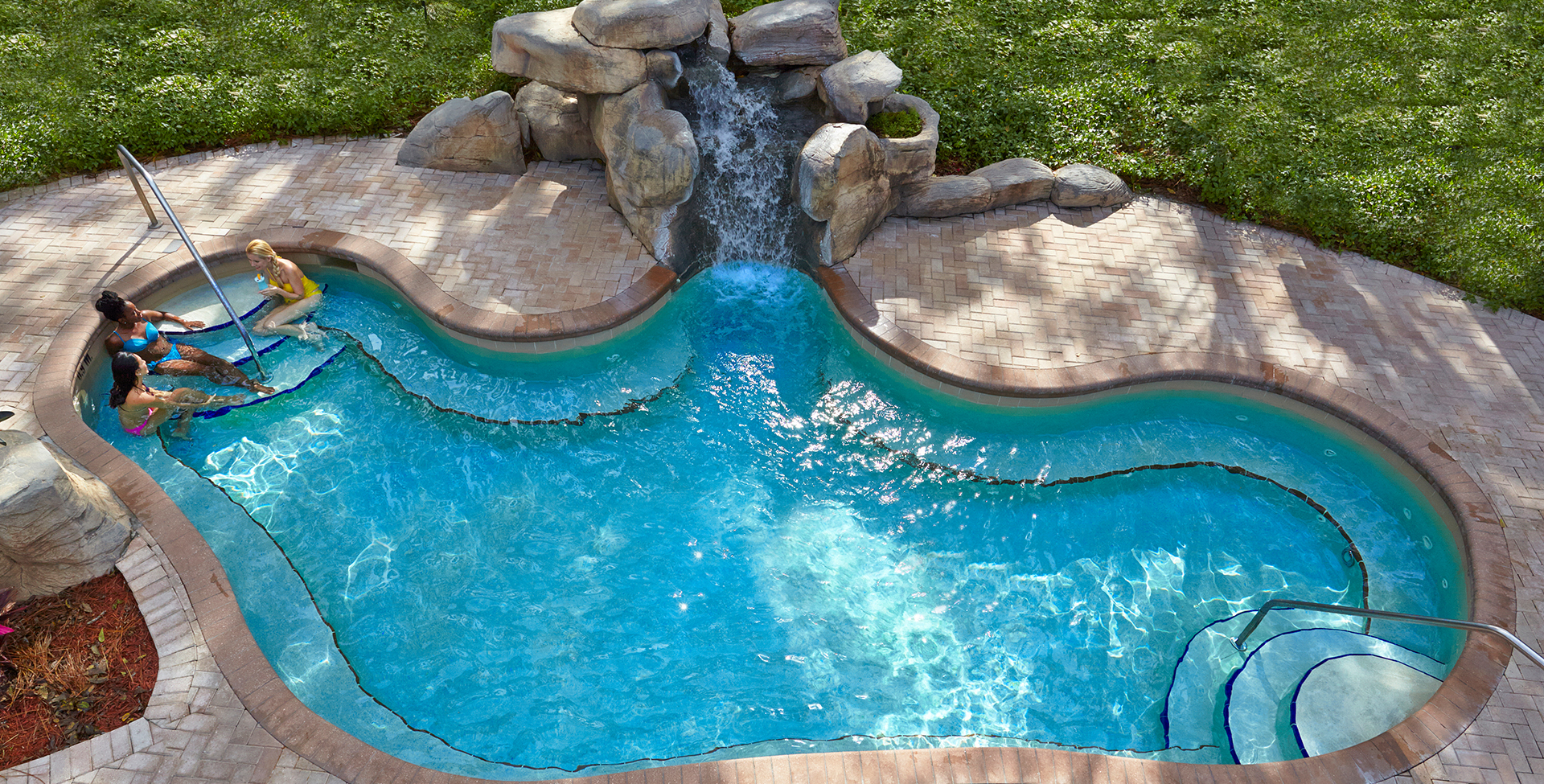 A small pool with a waterfall