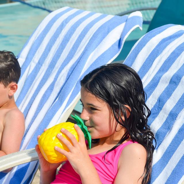 Kids relaxing by the pool