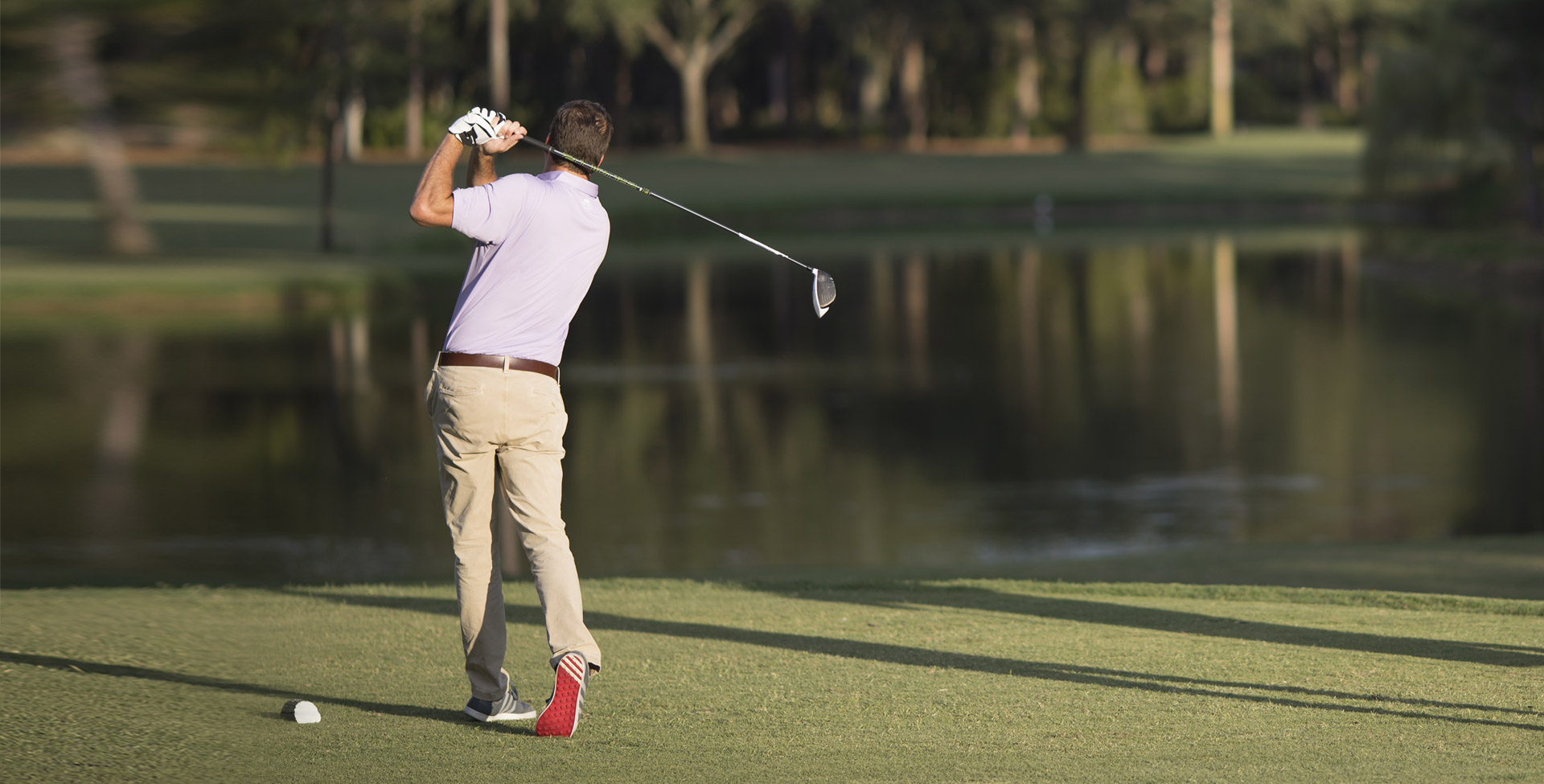 A man playing golf